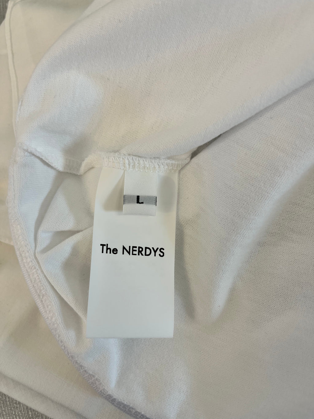 THE NERDYS × Brigitte Tanaka “Vinyl Graphic” T-Shirt