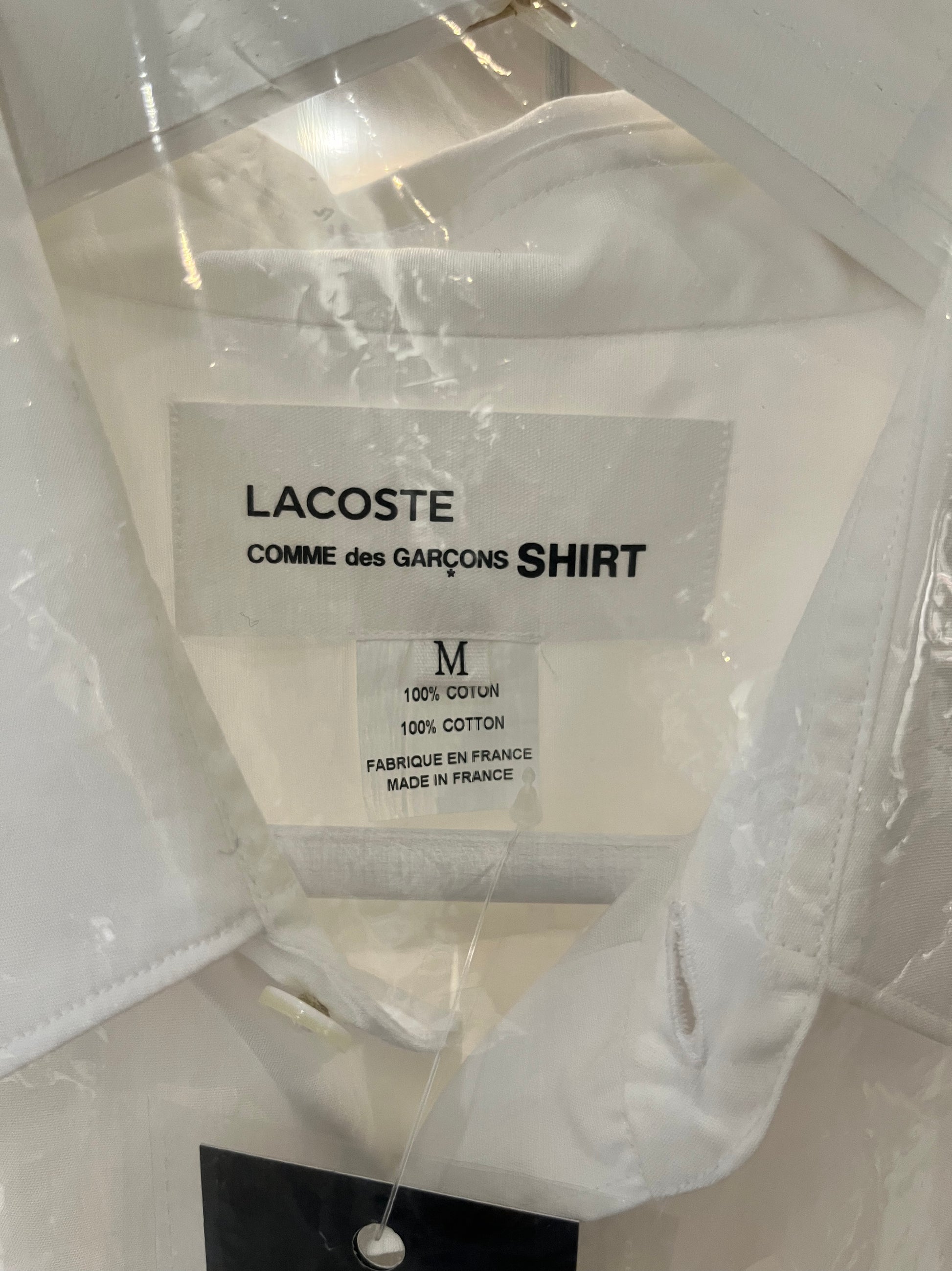 COMME des GARÇONS Shirt  lacoste collaboration